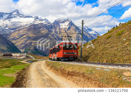 Beautiful view of the Swiss Alps with cogwheel train of Gornergrat railway close to Zermatt, Switzerland Beautiful view of the Swiss Alps with cogwheel train of Gornergrat railway close to Zermatt, Switzerland 136121708