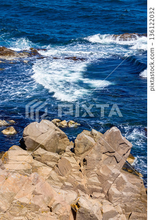 black sea coast on a sunny day. waves crashing rocks. beach near the cape skamni. south bulgaria travel destination. holiday at the seaside of europe. scene with no people black sea coast on a sunny day. waves crashing rocks. beach near the cape skamni. south bulgaria travel destination. holiday at the seaside of europe. scene with no people 136122032