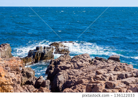 black sea coast on a sunny day. waves crashing rocks. beach near the cape skamni. south bulgaria travel destination. holiday at the seaside of europe. scene with no people black sea coast on a sunny day. waves crashing rocks. beach near the cape skamni. south bulgaria travel destination. holiday at the seaside of europe. scene with no people 136122033