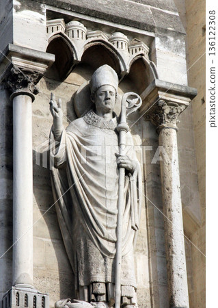Pope statue on Notre dame cathedral, Paris, France 136122308