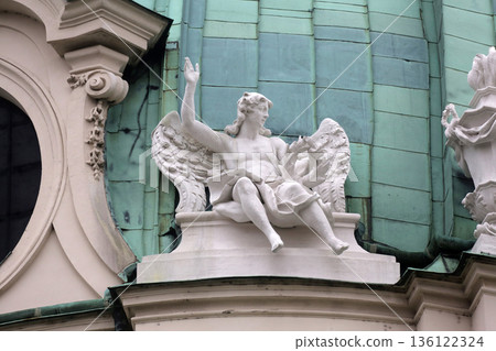 Angel statue, Karlskirche in Vienna, Austria Angel statue, Karlskirche in Vienna, Austria 136122324