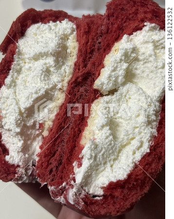 Soft and fluffy cream bread (크림빵) filled with sweet, silky cream, offering a perfect bite of pillowy texture and rich, creamy indulgence in every delightful mouthful. 136122532