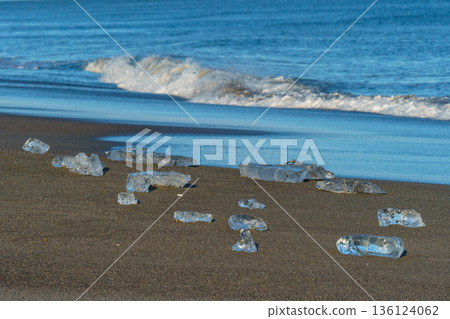 Jewelry ice washing up on Otsu Coast, Tokachi River Estuary, Hokkaido, Japan. 136124062