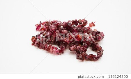 Red spinel chip stone macro photography white background Red spinel chip stone macro photography white background 136124200