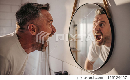 Angry man screaming at his reflection in mirror. AI-generated item 136124437