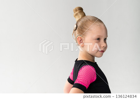 Child head with cochlear implant hearing aid. Copy space. Child head with cochlear implant hearing aid. Copy space. 136124834