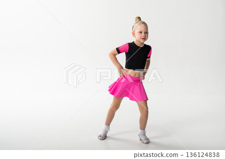 Portrait of child with cochlear implant during dance practice in studio. Copy space. Hearing loss treatment, auditory rehabilitation, assistive medical device, emotional adaptation, and inclusive 136124838