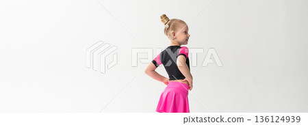 Portrait of child with cochlear implant during dance practice in studio. Banner with copy space. Hearing loss treatment, auditory rehabilitation, assistive medical device, emotional adaptation, and 136124939