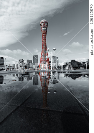 Symmetrical composition of Kobe Port Tower reflected on the water surface Symmetrical composition of Kobe Port Tower reflected on the water surface 136125070