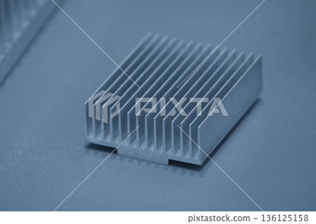 Close Up Aluminum Heat Sink Components for Electronic Cooling in Blue Tone Engineering Scene Close Up Aluminum Heat Sink Components for Electronic Cooling in Blue Tone Engineering Scene 136125158