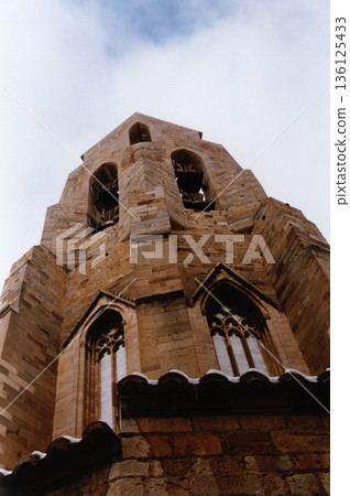 view of the bell tower of the town's main church view of the bell tower of the town's main church 136125433