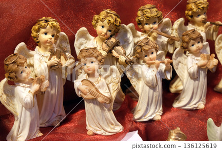 Angels, stall with decorations for winter holidays at traditional annual Christmas market in Zagreb, Croatia 136125619