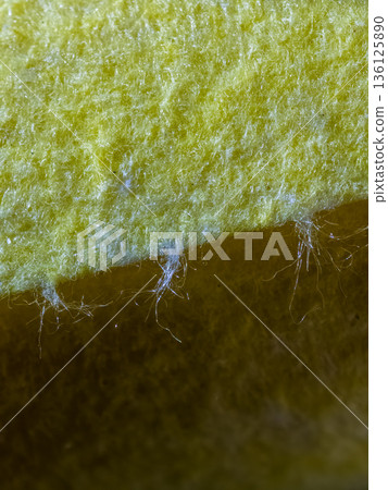 Yellow tennis ball felt macro detail showing texture Yellow tennis ball felt macro detail showing texture 136125890