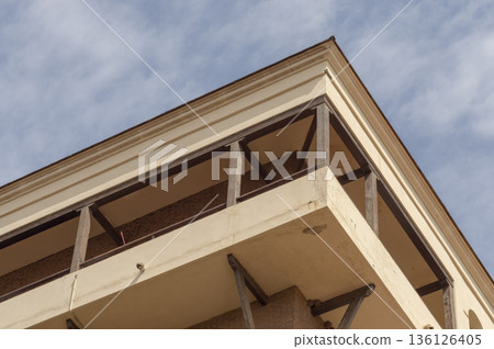 upper terrace of a building with wooden structures upper terrace of a building with wooden structures 136126405