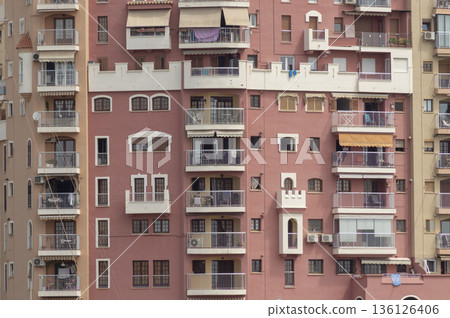 facade of a community with multiple balconies and windows of different sizes facade of a community with multiple balconies and windows of different sizes 136126406