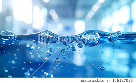 Blue underwater bubbles and water surface line | Clean aqua background and moisturizing skin care material 136127056