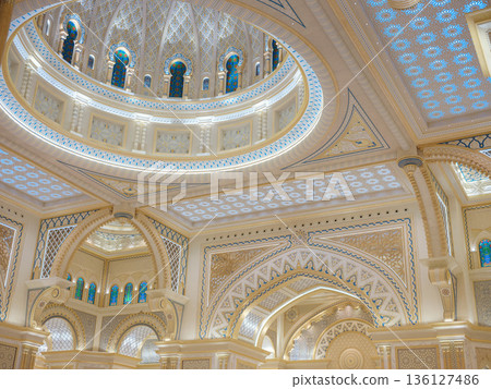 Abu Dhabi, UAE January 15, 2024 Breathtaking interior of Palace features massive golden dome and intricate mosaics. decorations royal opulence inside presidential palace of United Arab Emirates. Abu Dhabi, UAE January 15, 2024 Breathtaking interior of Palace features massive golden dome and intricate mosaics. decorations royal opulence inside presidential palace of United Arab Emirates. 136127486