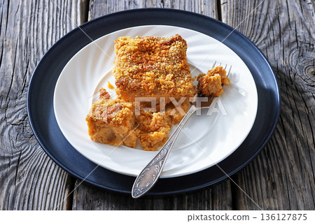 finnish rutabaga bake on a white plate finnish rutabaga bake on a white plate 136127875