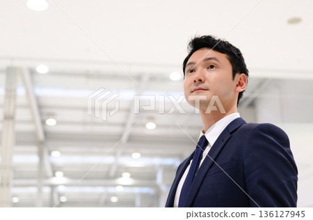 A man looking up at the factory. Photo courtesy of Kansai International Airport (KIX) A man looking up at the factory. Photo courtesy of Kansai International Airport (KIX) 136127945