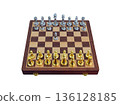 chessboard with golden and silver pieces isolated on white background 136128185