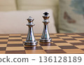 close-up of  silver chess pieces, the king and queen 136128189