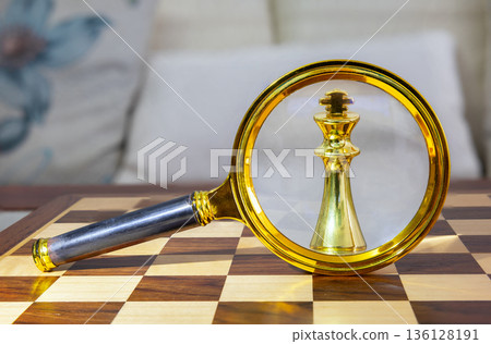 golden, king chess piece close-up 136128191