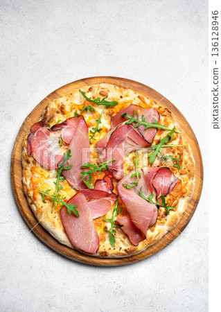 Prosciutto Cheese Pizza with arugula 136128946