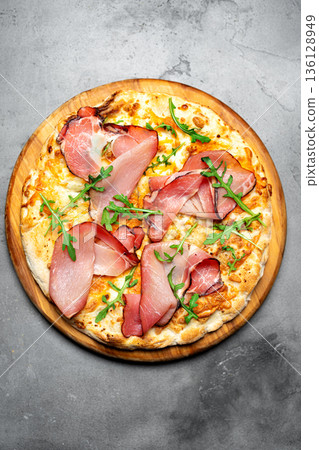 Prosciutto Cheese Pizza with arugula 136128949