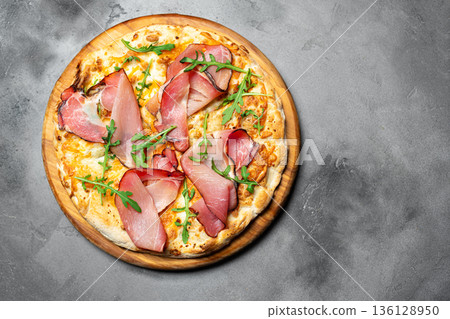 Prosciutto Cheese Pizza with arugula 136128950