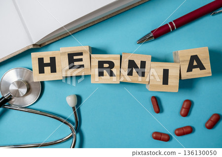 Wooden block with the word HERNIA written on it Wooden block with the word HERNIA written on it 136130050