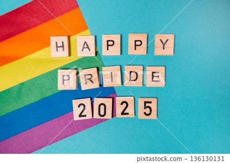 Rainbow flag is on a blue background with the words Happy Pride 2025 Rainbow flag is on a blue background with the words Happy Pride 2025 136130131