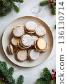 Plate of cookies with powdered sugar on top 136130714