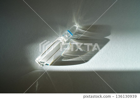 Ampoule casting abstract light and shadow patterns Ampoule casting abstract light and shadow patterns 136130939