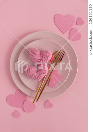 Romantic Table Setting with Knitted Hearts. Valentines Day Flatlay on Pink Background Romantic Table Setting with Knitted Hearts. Valentines Day Flatlay on Pink Background 136131150