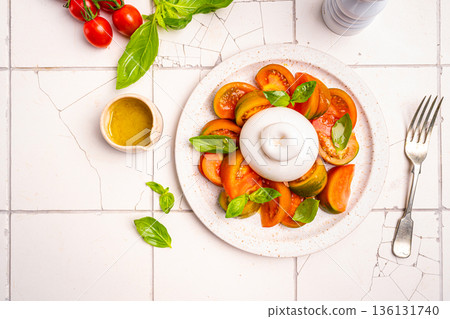 Caprese salad with burrata cheese 136131740