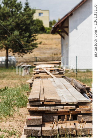 Stack of wooden piles plank boards Stack of wooden piles plank boards 136133110
