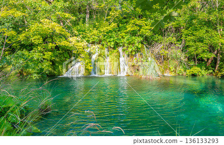 Beautiful waterfalls and lakes at Plitvice national nature park, Croatia. Fresh water stream in peaceful nature. Harmony and meditation, concept of peace and meditation in nature. 136133293