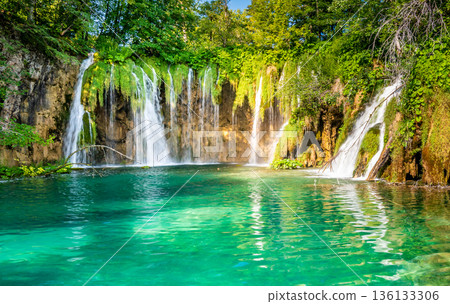 Beautiful waterfalls and lakes at Plitvice national nature park, Croatia. Fresh water stream in peaceful nature. Harmony and meditation, concept of peace and meditation in nature. Beautiful waterfalls and lakes at Plitvice national nature park, Croatia. Fresh water stream in peaceful nature. Harmony and meditation, concept of peace and meditation in nature. 136133306