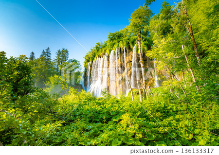 Beautiful waterfalls and lakes at Plitvice national nature park, Croatia. Fresh water stream in peaceful nature. Harmony and meditation, concept of peace and meditation in nature. Beautiful waterfalls and lakes at Plitvice national nature park, Croatia. Fresh water stream in peaceful nature. Harmony and meditation, concept of peace and meditation in nature. 136133317