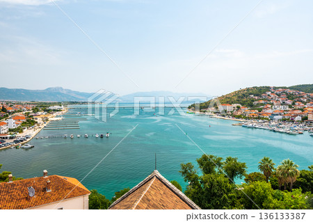 Aerial panoramic view of Trogir town, Croatia. Ancient building in old town, view to river and harbor. Aerial panoramic view of Trogir town, Croatia. Ancient building in old town, view to river and harbor. 136133387