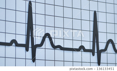 Heartbeat rhythm on ECG reading showing cardiology pulse monitoring 136133451