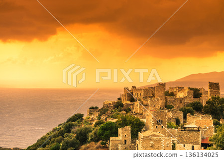 Tower houses in Vathia at sunset Greece Mani Peninsula 136134025