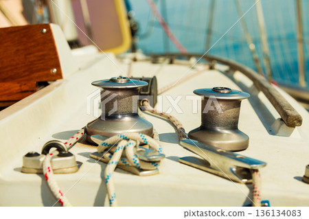 Yacht capstan on sailing boat during cruise Yacht capstan on sailing boat during cruise 136134083