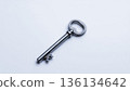 Antique-style keys placed on a simple background / Minimalist material that can be used to express concepts 136134642