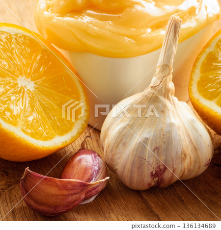 Honey garlic and lemon on wooden rustic table. Honey garlic and lemon on wooden rustic table. 136134689