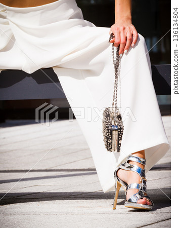 Silver high heels, purse and culottes Silver high heels, purse and culottes 136134804