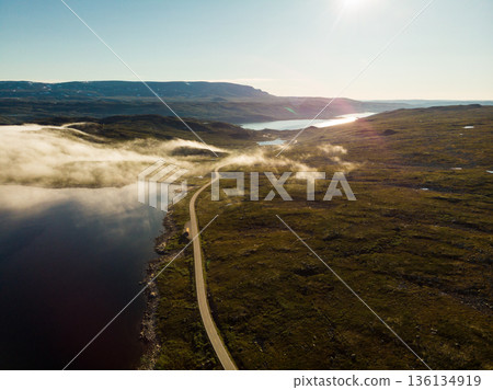 Road crossing Hardangervidda plateau, Norway. Aerial view. Road crossing Hardangervidda plateau, Norway. Aerial view. 136134919