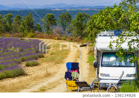 Clothes hanging to dry outdoors by camping car. Caravan vacation in France 136134926