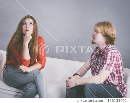 Woman and man after argue on sofa 136135051