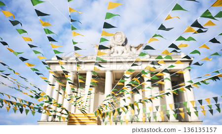 Bunting flags celebrating festival in front of building 136135157